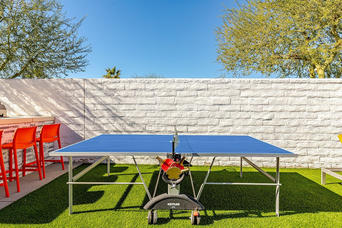 Enjoy a sunny match on the outdoor ping pong table