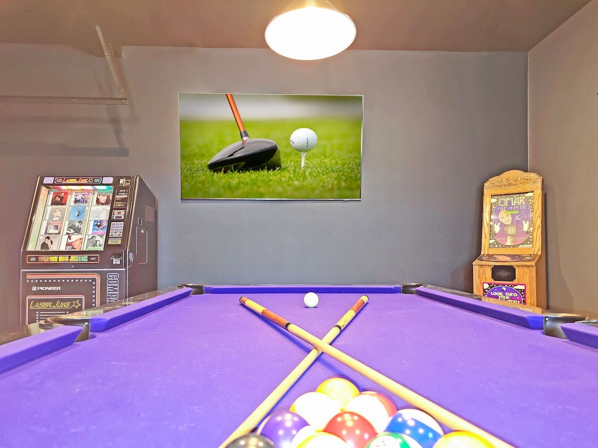 Full-size pool table, perfect for friendly competitions and leisurely games.