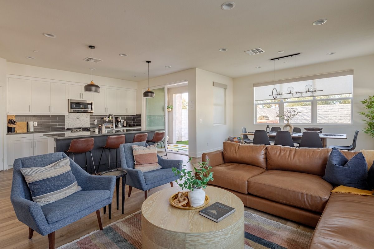 The kitchen, dining room, and living room flow seamlessly together, creating a warm and engaging atmosphere for family and friends. Enjoy easy conversation, shared meals, and quality time in this inviting open-concept space.