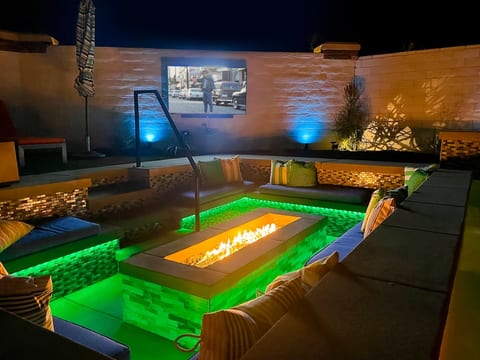 Gather around the sunken firepit to watch a movie and have fun