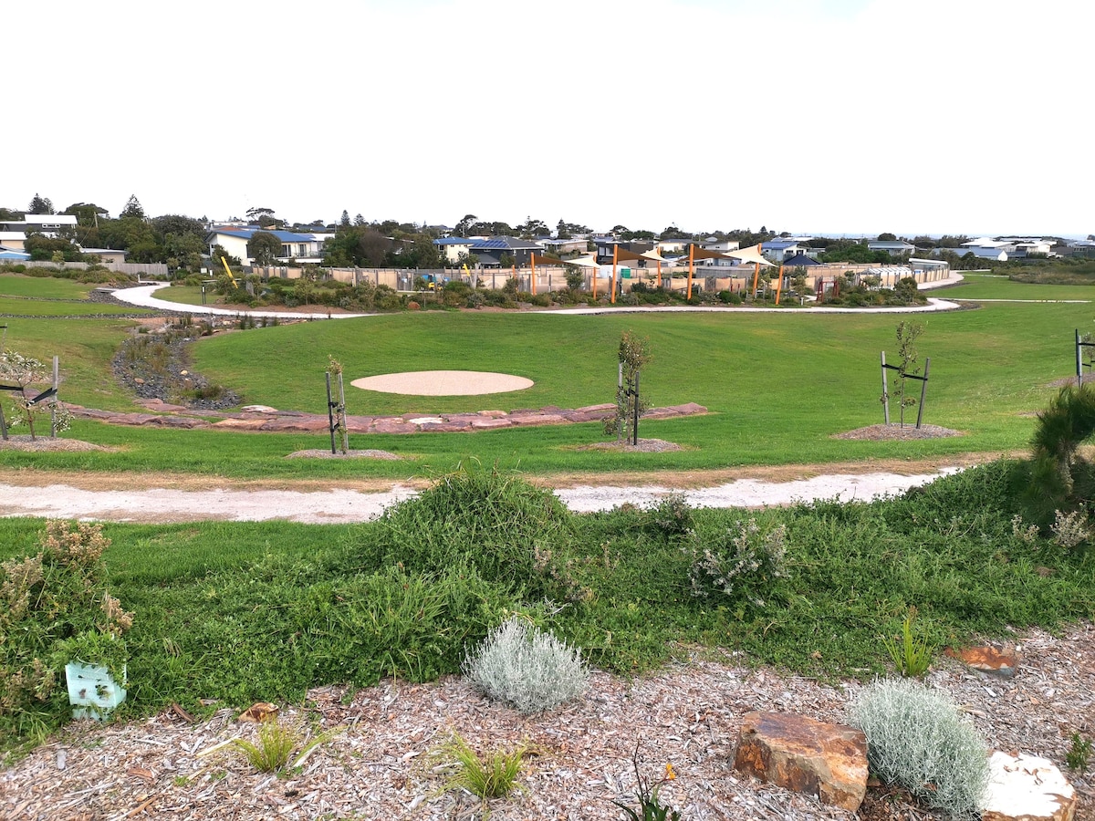 Views of the amphitheatre, playground and farm.