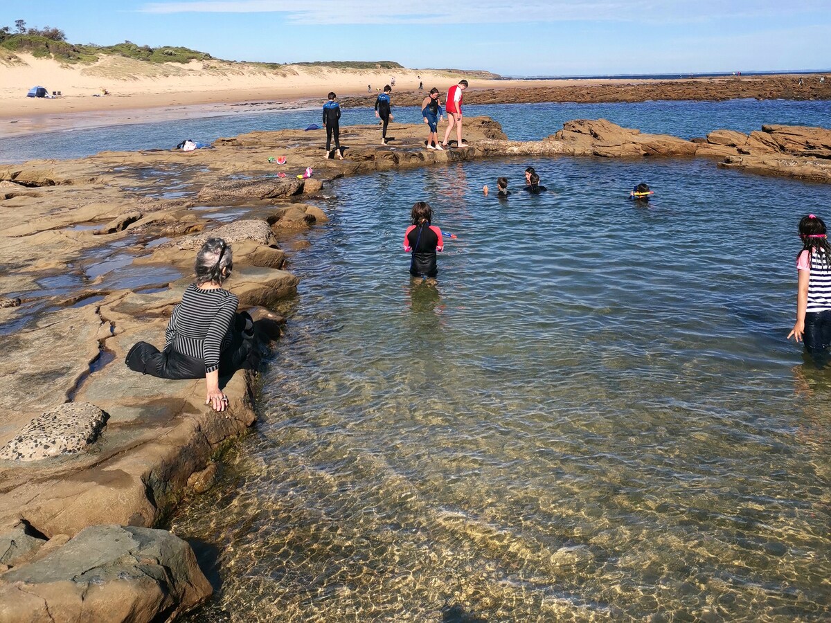 Swimmers in the Rock Pool. 15 min walk from the Eco Beach House.