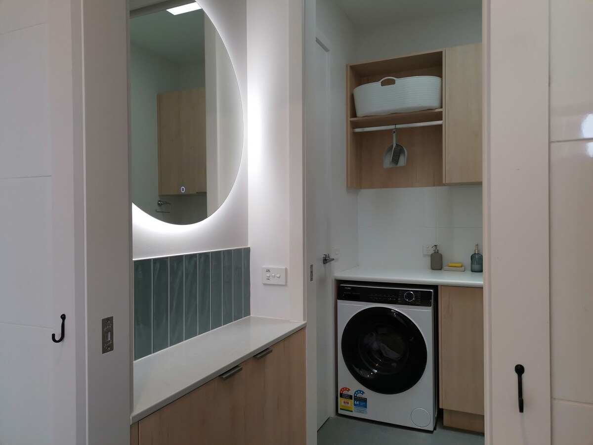 Washing machine and tub. Indoor racks and outdoor washing line for drying.