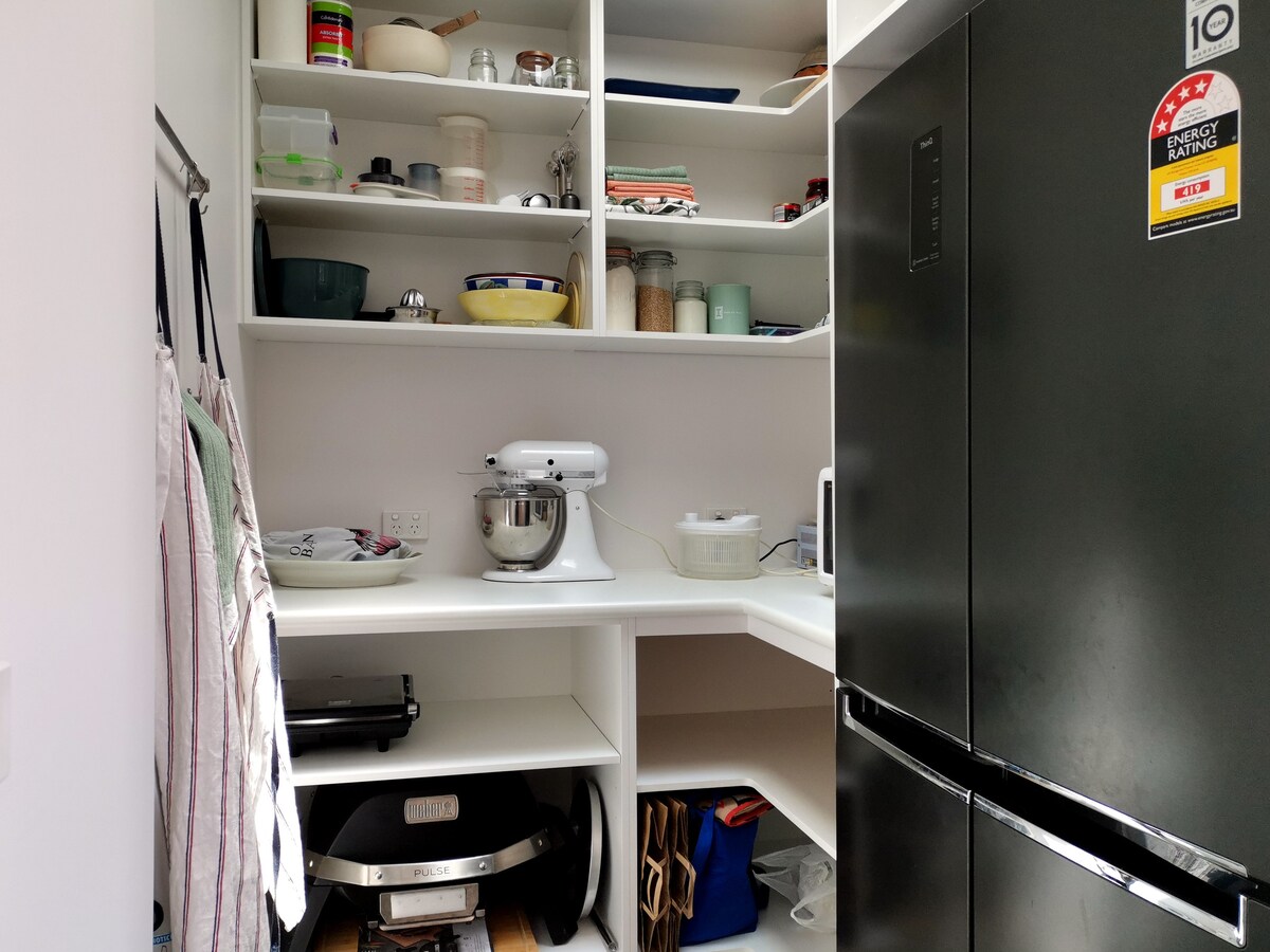Pantry with Kitchenaid mixer, LG 530L French Door Fridge, sandwich press, stick blender, rice cooker and microwave.
