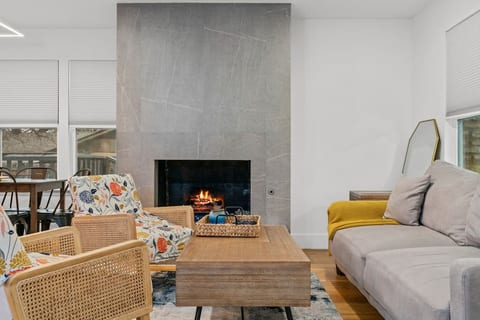 Plenty of seating for the entire group! The coffee table also opens and expands for those TV dinner nights - mid century modern feel with very comfortable furniture!