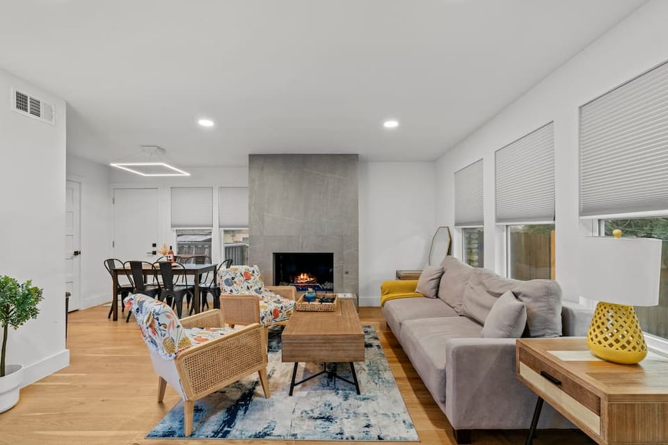 Enjoy this beautiful living room! A sleeper sofa that’s as comfortable as a bed, and a fireplace that keeps the home warm in winter! There’s also a smart TV so the entire crew can enjoy any of your favorite shows!