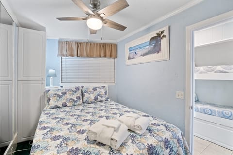 Queen size bed in primary bedroom