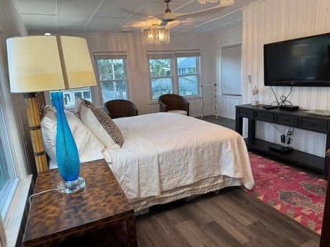 Primary king size bedroom overlooking creek with a new private bath