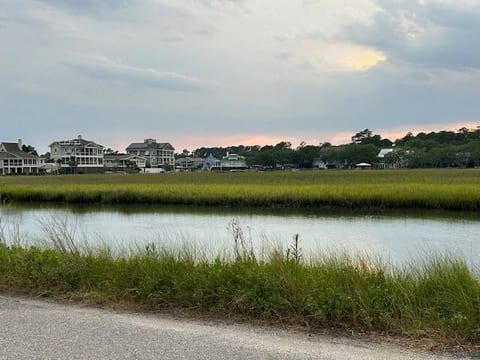 From front porch, watch nature, grab a fishing pole, or cast net and get dinner