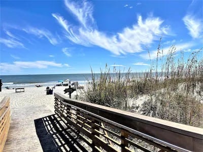 Shipyard Beach access is beautiful and functional!  Two access paths joined by a shower and restroom facilities.  There’s a snack shack that has lunch items, soft drinks and adult beverages!