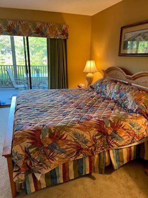 Primary king bedroom with direct access and views of the lagoon