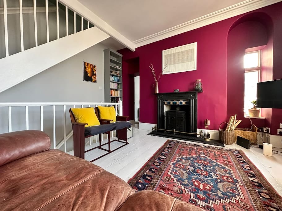 Our wonderful comfy lounge with large leather sofa plus unique vintage cinema seats that add a quirky flavour to the room.