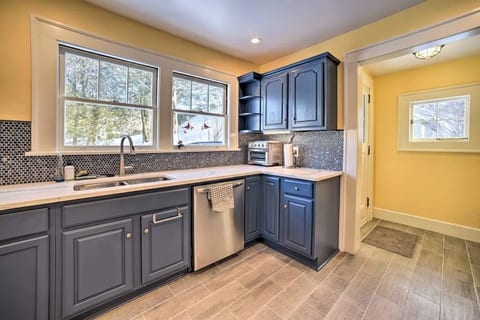 Sleek, modern kitchen equipped with state-of-the-art appliances and a spacious layout for culinary adventures