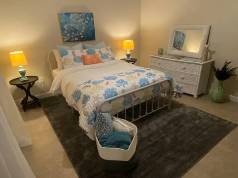 Luxurious bedding and dresser storage.
"Almond Blossoms" by Vincent van Gogh