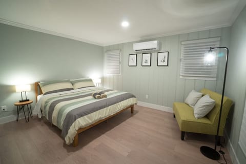 The master room features a king bed, small sofa, and a dresser with mirror. I am still decorating this room, so when you arrive, the room may look slightly better/worst. Shooting for the former impression though!