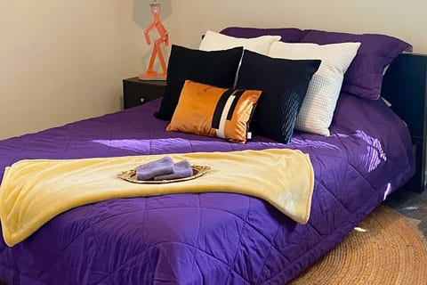 Mad Hatter's room includes a full-length mirror, a dedicated workspace, a nightlamp, clothes hangers, a hamper, and storage cubbies for your belongings.