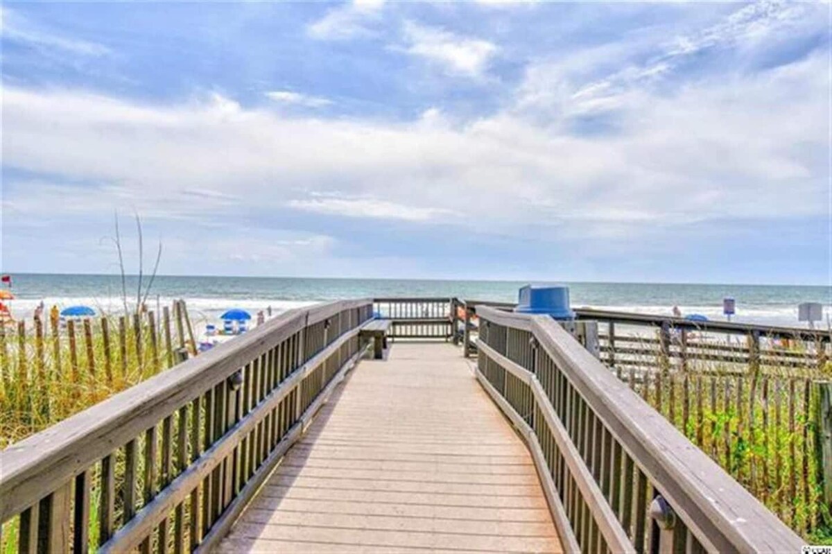 Stroll down the scenic pathway and feel the sand between your toes in minutes from your cozy seaside retreat!