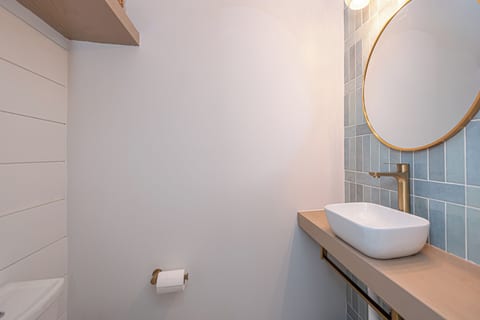 Another view of the half bathroom