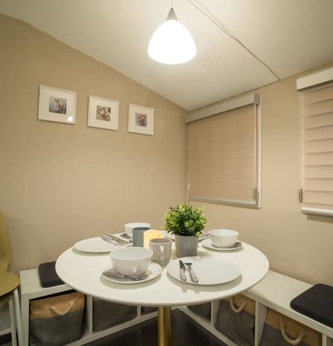 Breakfast nook and dining area. This table can sit four comfortably.