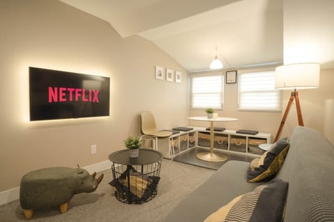 Cozy second floor living room with dining/nook area. Night shot. Day shot. Added a critter ottoman for seat/leg rest. It's pretty awesome!