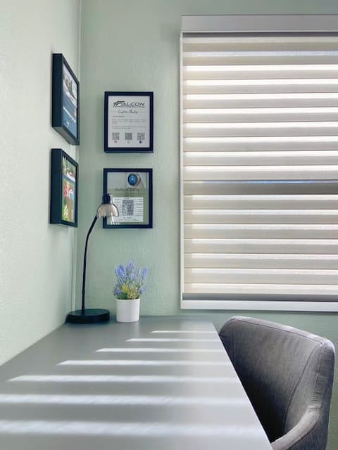 A very long and brightly lighted desk for your work from home experience. You can even hook up your laptop to the TV, making this space very useful for your traveling needs.