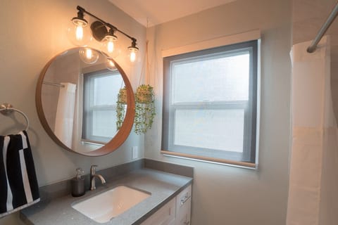 Your generously sized private bathroom. Comes with a full bathtub, oversized mirror, and hairdryer.