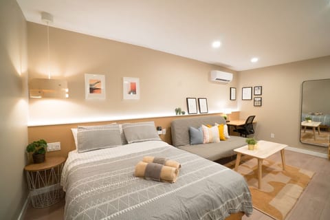 Your own private studio with queen bed. The studio comes with a full kitchenette and a full private bathroom. This studio is recently remodeled. The bed is a luxury medium firm mattress by Beautyrest!