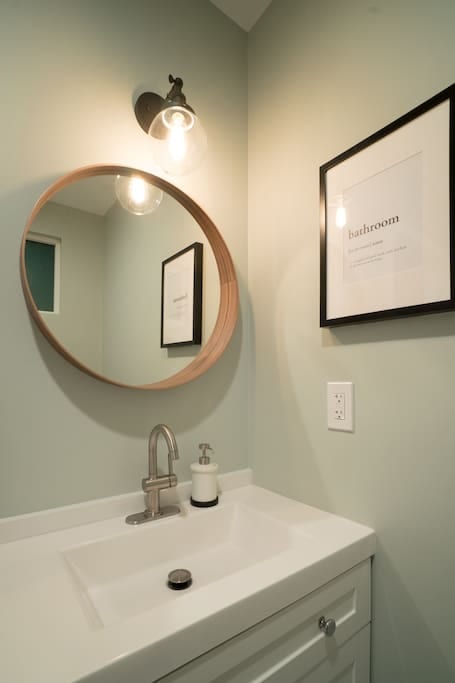 Your generously sized private full bathroom. Comes with a shower, toilet, mirror, and hairdryer.
