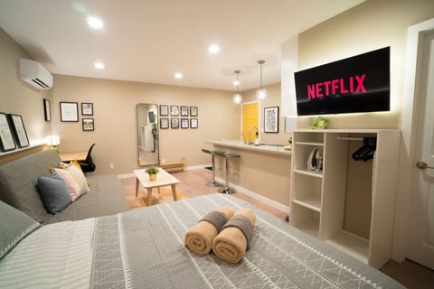 Indulge yourself in this freshly remodeled studio. Comes with everything travelers need to stay comfortably; a boutique closet for your traveling needs; TV w/ backlight to enhance your viewing experience; comfortable couch for 3; Desk area for wfh.