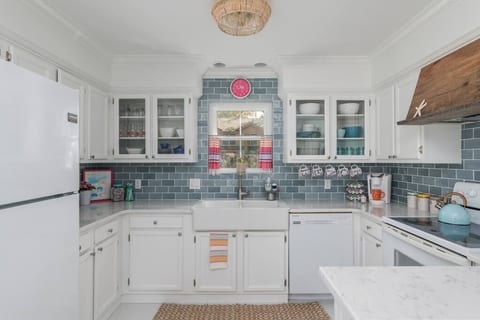 Fully-equipped kitchen with everything needed for cooking in. Ample glassware, flatware, cookware, serving pieces...all that's needed for a dishing up a delicious meal!
