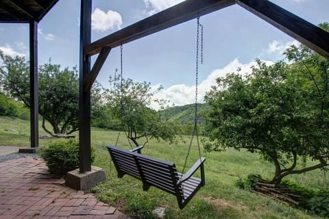 Watch the deer and wild turkeys walk right past you, while you relax on the swing!