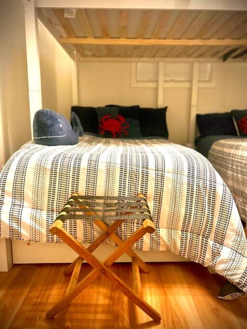 Triple bunk bed. Full size bed on the top. And two twin beds on the bottom.