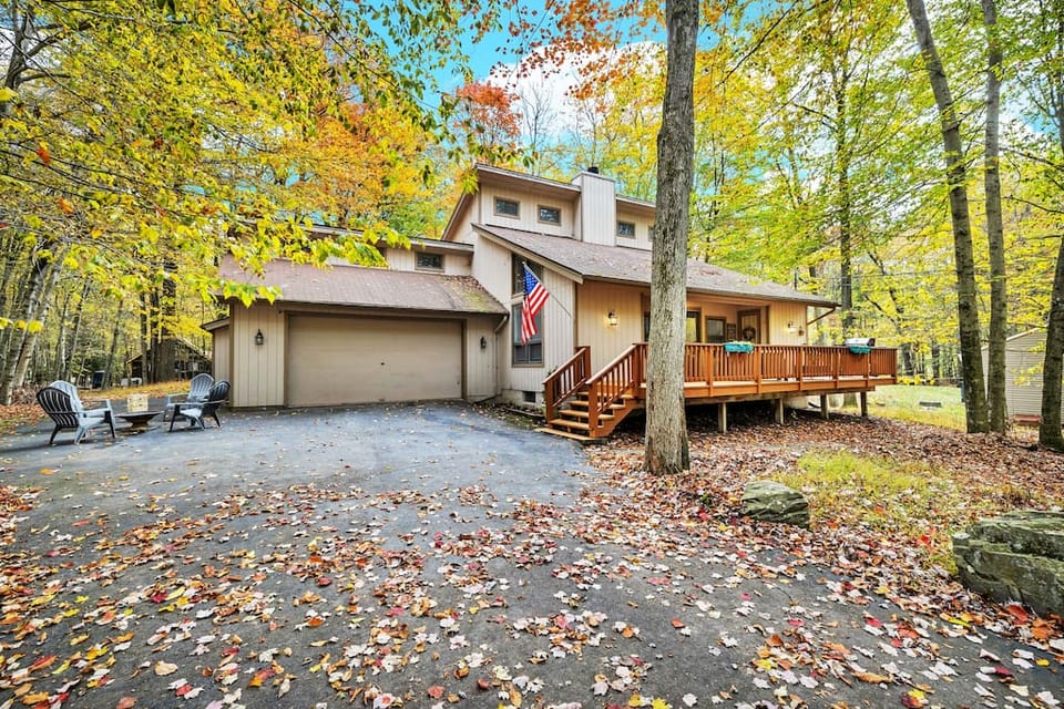 Gather 'round the warmth of nature's embrace - our rustic wood fire pit and contemporary gas fire table set the stage for unforgettable family gatherings at our spacious nature house. Ample parking and a welcoming deck await your arrival.