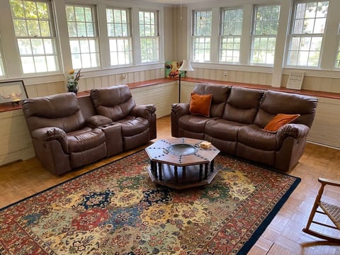 Lower living/rec room with new furniture. A great place to watch your favorite movie or game. Seating for six.