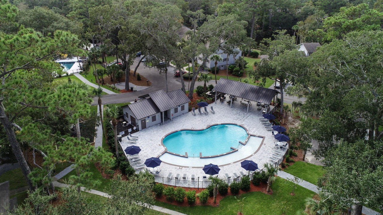 Pool #1 featuring large cabana with seating/dining area. Has zero depth area and bathrooms.