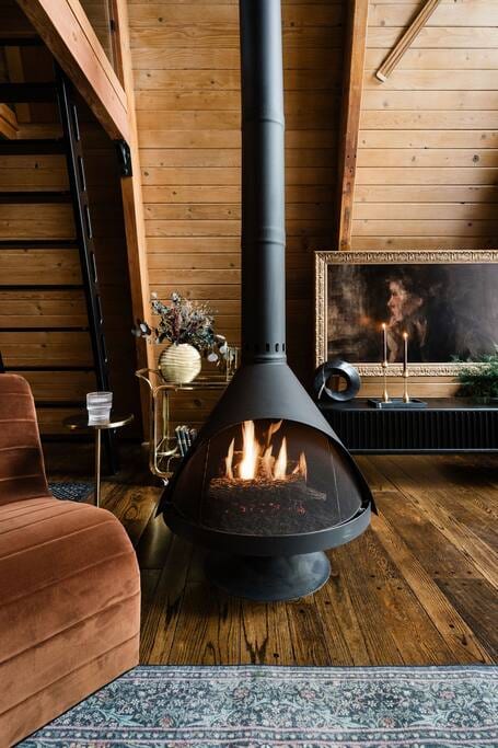 The iconic gas fireplace is the star of the show in the lower-level living room.