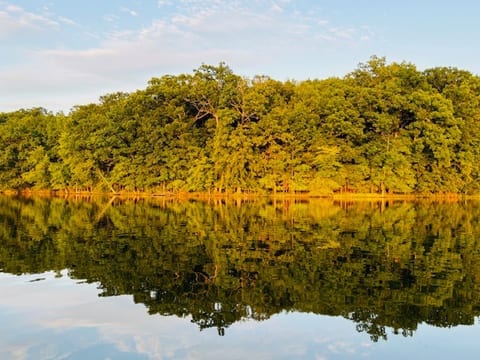 Pre-sunset view across the lake.  If you zoom in, you can see a cute baby deer. 