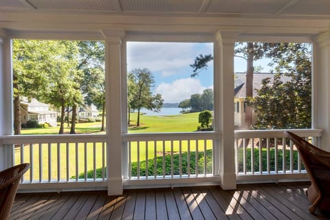 View From The Lower Level Screen Porch - Features Both An Outdoor Sitting Area As Well As Outdoor Dining Table