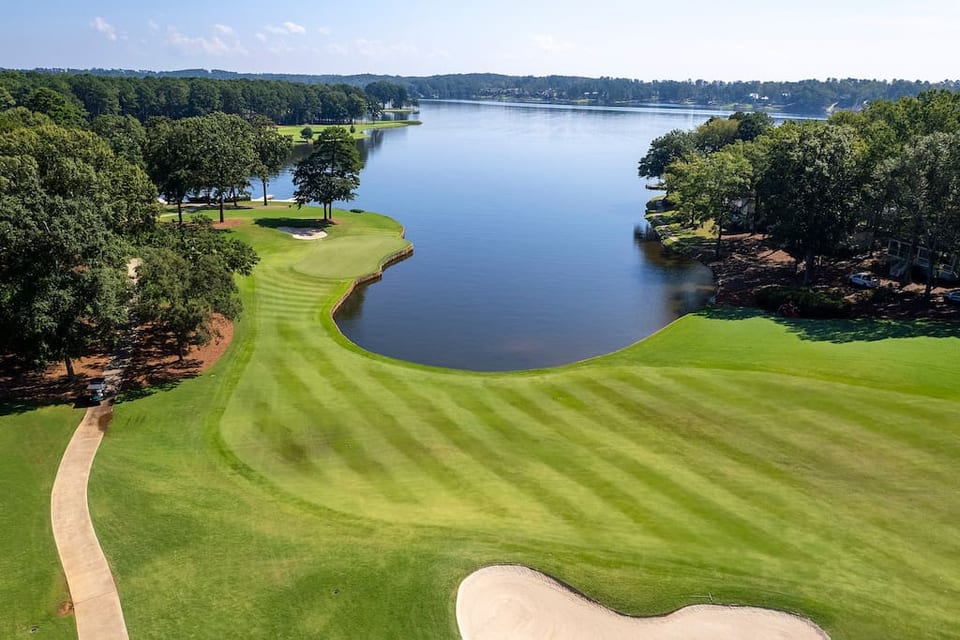 Home Overlooks The Challenging 9th Hole With A Backdrop Of Lake Oconee