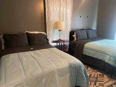 Drift off to dreamland in the comfort of our stylish and inviting bedroom.