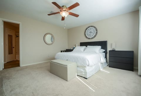 Experience the luxury of a good night's rest in our cozy and stylish bedroom.