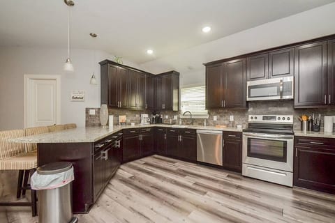 Cook up a storm in our fully-equipped kitchen – a foodie's paradise!