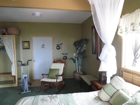 first floor bedroom with its own bathroom and fridge in gameroom