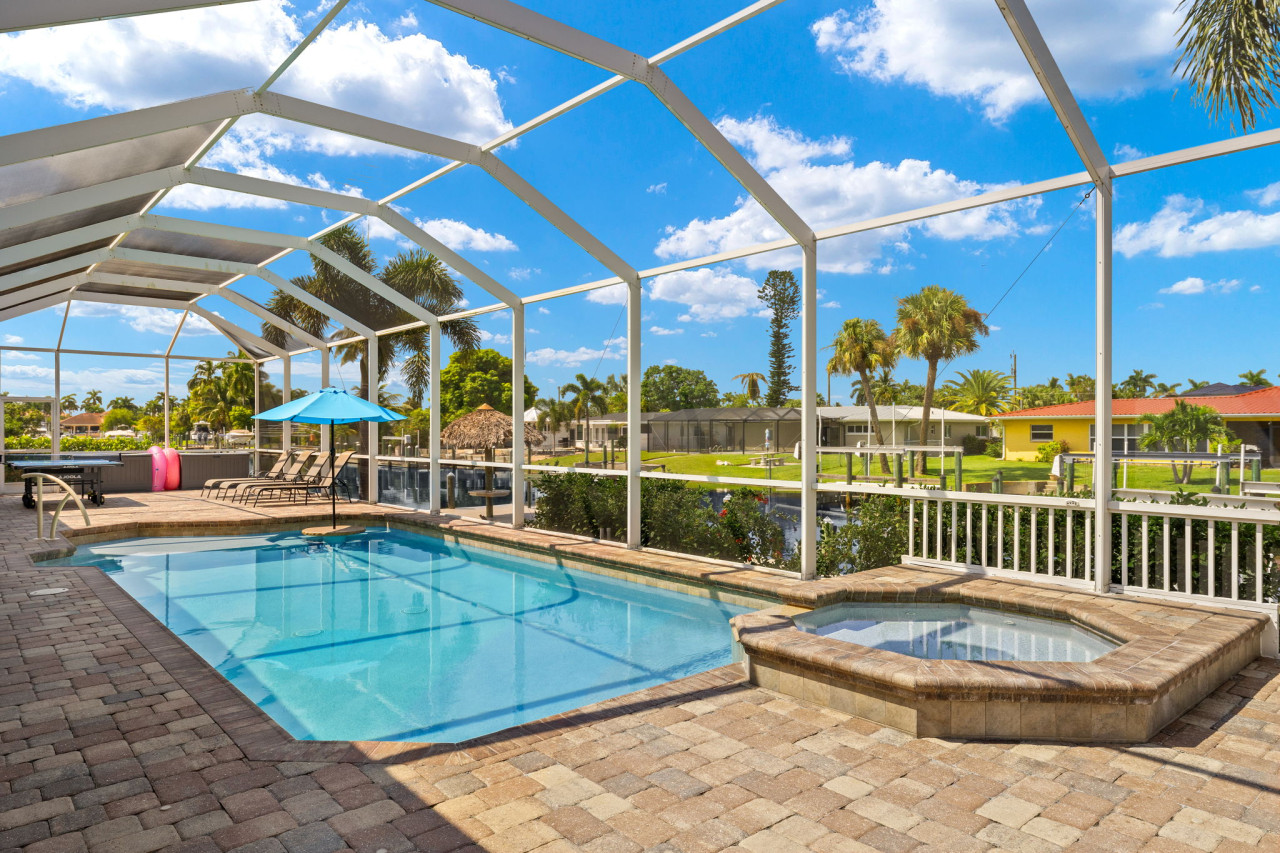 Large lanai area with heated saltwater pool and spa. No charge for heating the pool