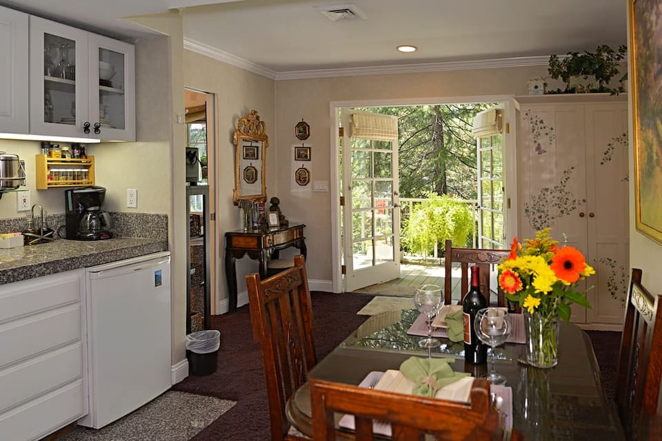 Kitchen area out towards private deck and yard.