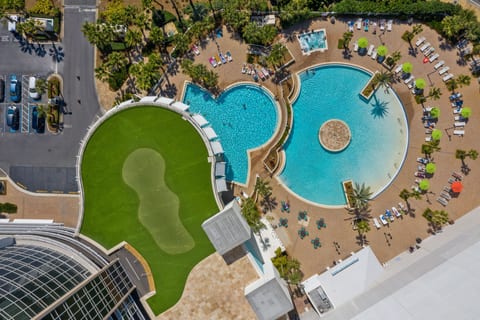 Resort Condo with 5 Pools & Beach Access
