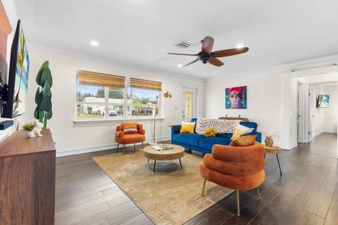 Cozy living room with 65" 4K Smart TV