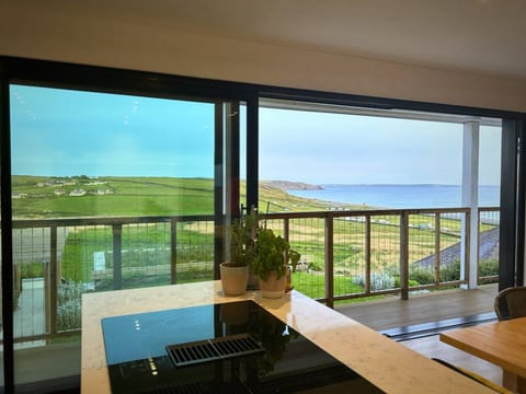 5-Bed Coastal Retreat w/ Studio, Sauna & Sea Views