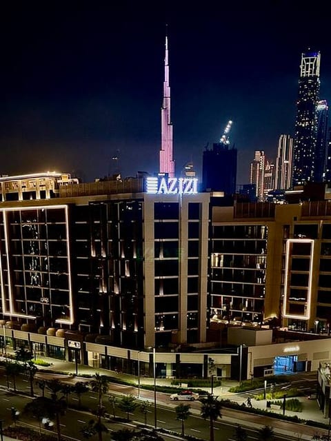 Relaxing on my terrace with the stunning Burj Khalifa view - the perfect spot to unwind and take in the breathtaking beauty of Dubai's iconic skyline.