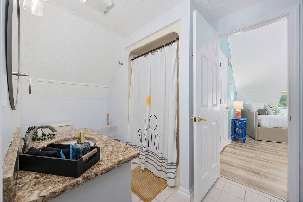 Jack and Jill bathroom has dual access from Bedroom 4 and Bedroom 5/Gameroom